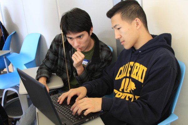 students in tutoring session